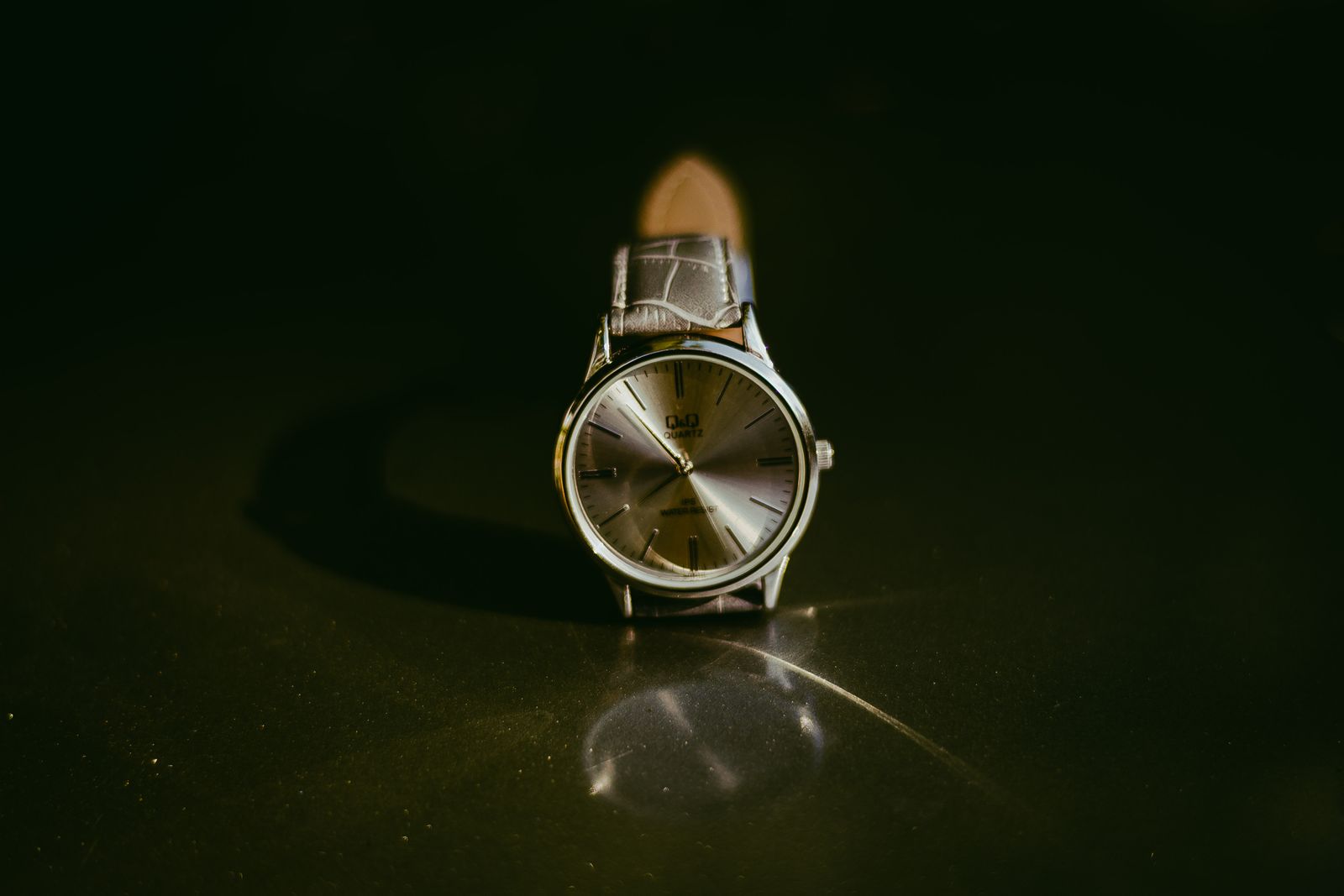 Classic silver wristwatch with leather strap
